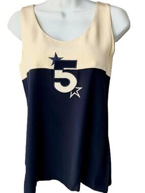 The Laurel Silk Sleeveless Colorblock Top in Beige and Black is a stylish and el